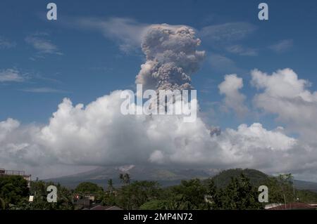 A Huge Column Of Ash Shoots Up To The Sky During The Eruption Of Mayon