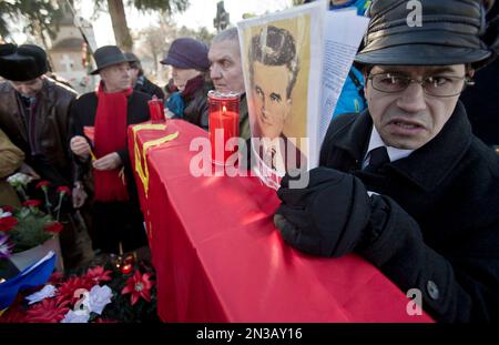 Communism Nostalgics Gather Around The Grave Of Romanian Communist