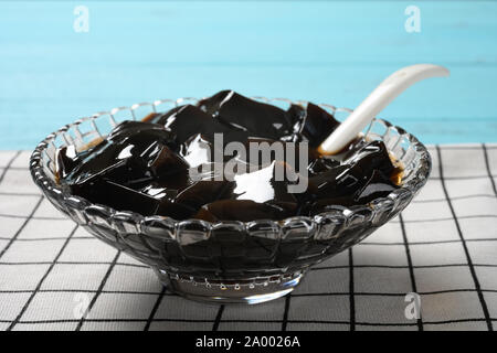 side view bowl of Licorice black jelly close up Stock Photo