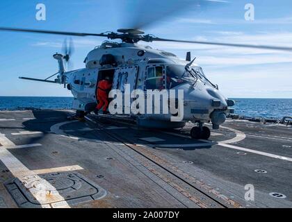 190916-N-UB406-0038  ATLANTIC OCEAN (Sept. 16, 2019) An NH90 helicopter assigned to the Royal Netherlands navy frigate HNLMS Van Speijk (F 828) prepares to take off from the flight deck of the U.S. Navy guided-missile destroyer USS Gridley (DDG 101) after Royal Canadian Navy leadership met with leadership of Standing NATO Maritime Group One and Gridley aboard the ship during exercise Cutlass Fury 2019. Cutlass Fury is designed to be a biennial, medium-scale exercise off the coast of Nova Scotia and Newfoundland, with the purpose of unifying Canada's Atlantic Fleet, Allied Navies, and other joi Stock Photo