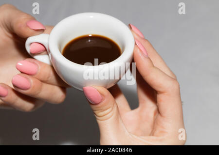 Taking the neapolitan coffee in ceramic cup Stock Photo