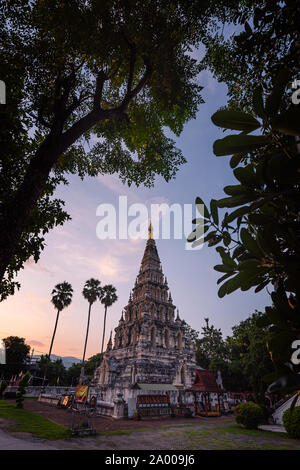 Ancient Pagoda in Wat Ku Kam temple with sunset light. Chiang Mai, Thailand. Stock Photo