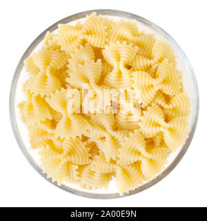 Farfalle pasta in glass bowl isolated on white background with clipping path Stock Photo