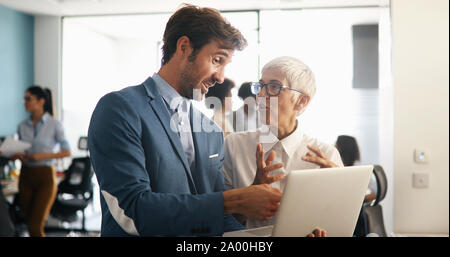 Programmer working in a software developing company office Stock Photo