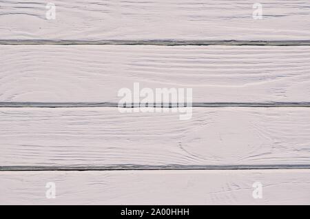 Wooden background texture. Creatively painted intense white boards. Stock Photo