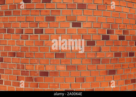 Horizontal red bricks background. A part of wall of the building Stock Photo