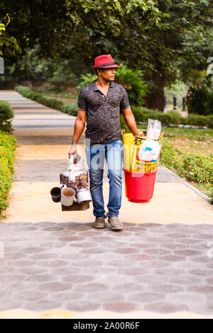 Kolkata, India, 1 May, 2019 – Roadside indian tea-seller (chaiwala) selling masala Chai in street. Kolkata is tea capital of India. Sugary, spicy darj Stock Photo