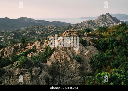 The Désert des Agriates / Desert of Agriates a barren dry scrub and rock wilderness landscape in the Balagne region of northern Corsica. Stock Photo