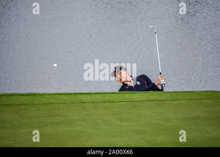 Lexi Thompson plays a bunker shot during the 2019 Solheim Cup Stock Photo