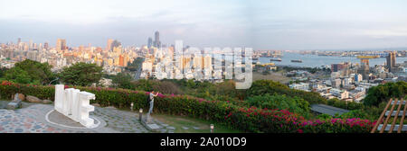 Panorama View of the Martyrs Shrine in Kaohsiung, Taiwan. Word Love in giant letters in front of the Kaohsiung Skyline Stock Photo