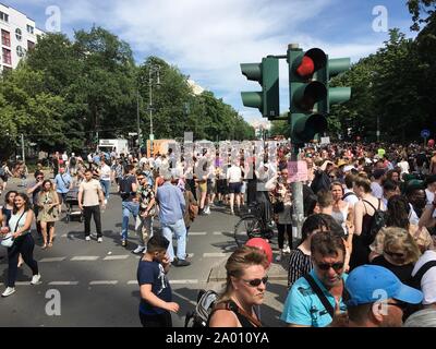Berlin, Germany - June 9, 2019: Crowd attending the Carnival of Cultures Parade (Karneval der Kulturen Umzug) - a multicultural music festival in Kreu Stock Photo