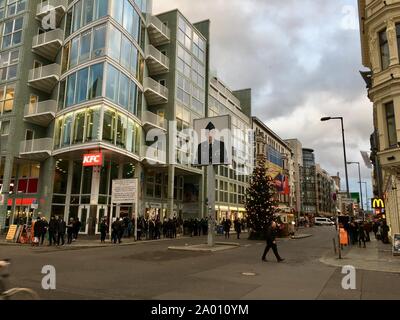 Berlin, Germany - December 10, 2018: Large Christmas Tree at Checkpoint Charlie Stock Photo