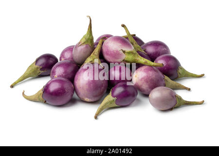 Heap of fresh raw purple mini eggplants  isolated on white background Stock Photo