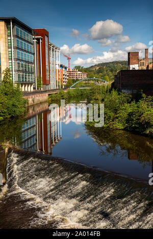 UK, Yorkshire, Sheffield, riverside buildings beside River Don weir, from Lady’s Bridge Stock Photo