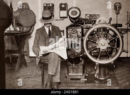The latest engineering and technology from the 1930s: Automatic marine steering. By linking the steering mechanism to gyroscopic apparatus and the compass a large ship can be guided in accordance with the gyroscopes direction. Stock Photo