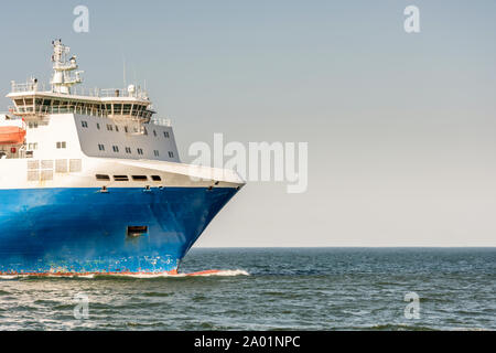 Bow of a ferry in the Baltic Sea with copy space in the sky Stock Photo