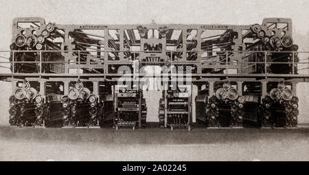 The latest engineering and technology from the 1930s: a modern, giant newspaper press powered by 2 85 HP motors. It can produce 100,000 24 page newspapers per hour and also has automatic folders and late news devices. Stock Photo