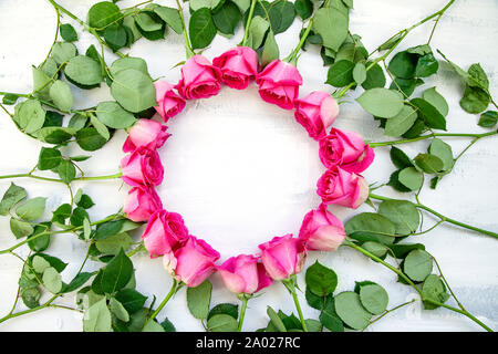 Circle flatlay Frame made of pink rose flowers Stock Photo