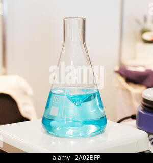 Chemical laboratory. Flasks and dishes with solutions ready for research activities. Laboratory test tubes and flasks.
