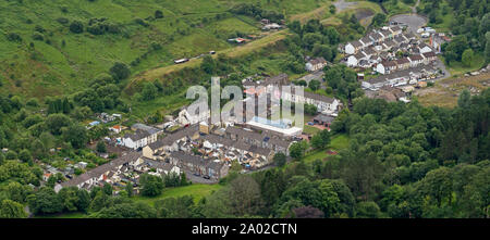 Rows of terraced houses in bottom of valley in former coal mining town, Treherbert, Wales, UK Stock Photo