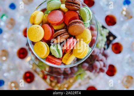 candy bar with a multicolored macaroon on candy bar, candy bar on holiday, candy bar at the wedding Stock Photo