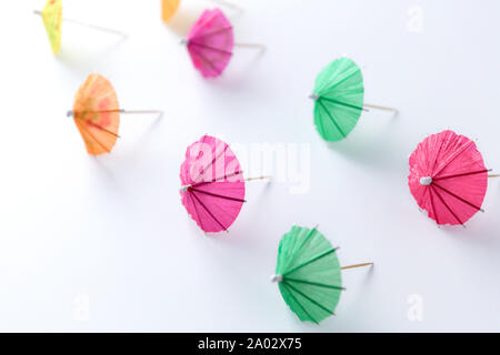 cocktail umbrellas on white background Stock Photo