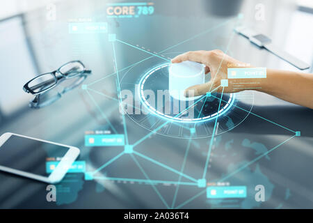 hand with control knob on interactive panel Stock Photo