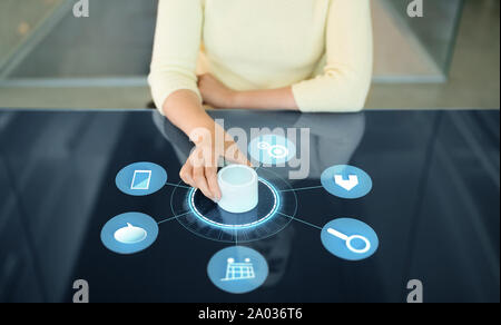 woman with control knob on interactive panel Stock Photo