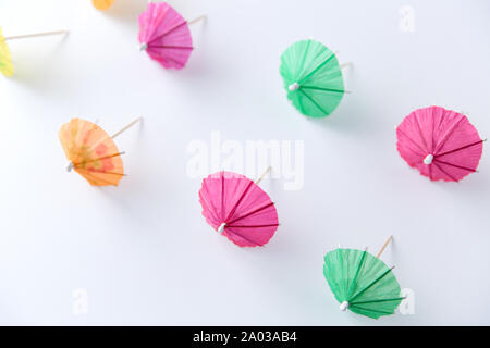 cocktail umbrellas on white background Stock Photo