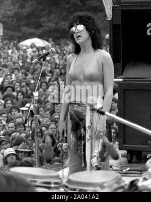 Grace Slick is performing onstage at a free Jefferson Starship