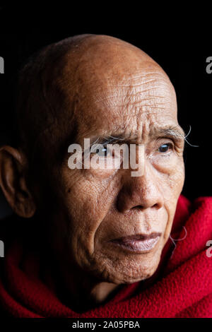 A Portrait Of A Buddhist Monk at Ywa Thit Monastery, Nyaung Shwe, Shan State, Myanmar. Stock Photo