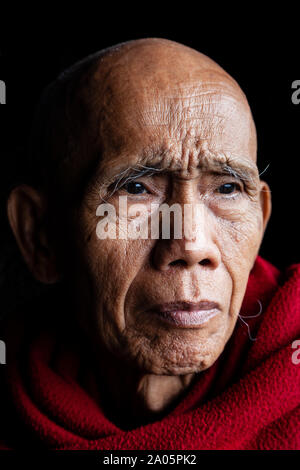 A Portrait Of A Buddhist Monk at Ywa Thit Monastery, Nyaung Shwe, Shan State, Myanmar. Stock Photo