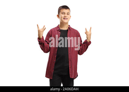 Cheerful teenage boy making a hand gesture sign of the horns isolated on white background Stock Photo