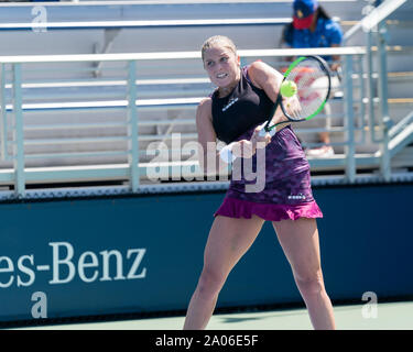 Caroline Dolehide in action against Yulia Putintseva in their women's ...