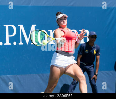 Caroline Dolehide in action against Yulia Putintseva in their women's ...