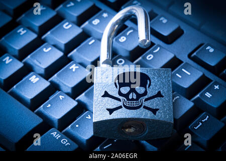 Cyber security concept open padlock on the computer keyboard. Stock Photo