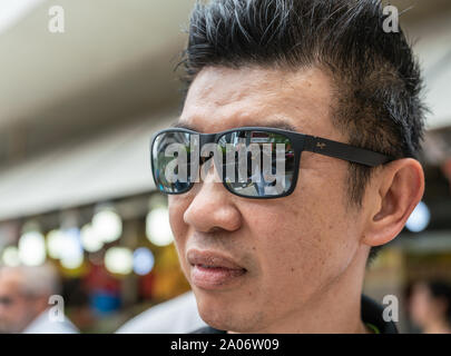 An Asian Man with a Mustache Face Wearing a Shirt and Sunglasses in a Very  Masculine Style Stock Image - Image of isolated, adult: 269063279