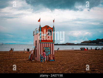 Punch and Judy show on Weymouth Beach, Dorset, England. Performed by Professor Mark Poulton since 2005. Stock Photo