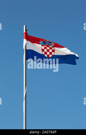 The Croatia flag flying , or Croatian flag flying, on a flagpole, Dubrovnik, Croatia Europe Stock Photo