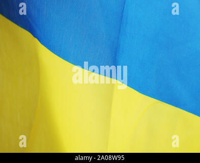 The Flag Of Ukraine Is A Banner Of Two Equally Sized Horizontal Bands Of Blue And Yellow. Stock Photo