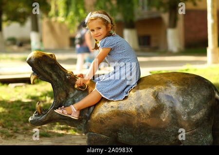 Portrait of a three year old girl on the summer playground Stock Photo