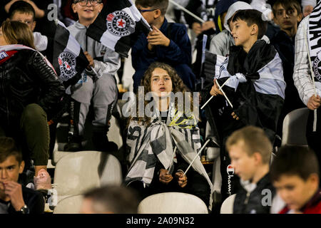 19th September 2019; Stadion FK Partizan, Belgrade, Serbia; Europa League Football, Partizan Belgrade versus AZ Alkmaar; A young fan of Partizan supports his team Stock Photo