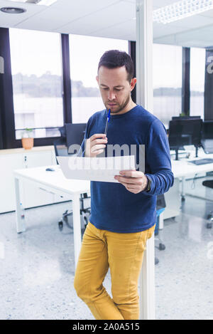 businessman looking at documents Stock Photo