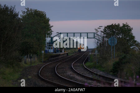 Arriva Northern rail class 156 sprinter train departing from  Kirkby In Furness railway station on the Cumbrian coast railway line Stock Photo