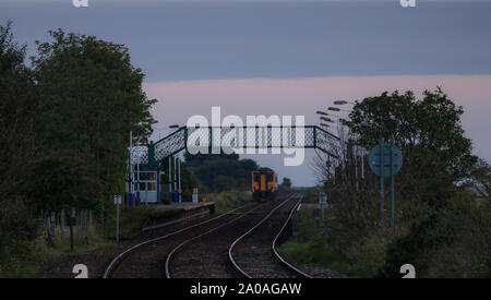 Arriva Northern rail class 156 sprinter train departing from  Kirkby In Furness railway station on the Cumbrian coast railway line Stock Photo