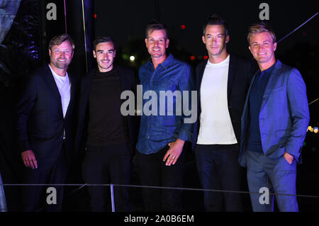 (left to right) Alex Thomson, Harry Winks, Henrik Stenson, Andre Lotterer and Nico Rosberg at the christening ceremony for the Hugo Boss yacht in London. Stock Photo