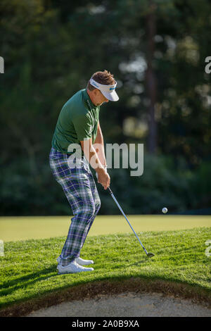 Wentworth Golf Club, Surrey, UK. 19th Sep 2019. European Tour Golf, BMW PGA Championship Wentworth; Ian Poulter (ENG) currently ranked number 12 in the Race to Dubai chipping the ball on the 13th green Credit: Action Plus Sports Images/Alamy Live News Stock Photo