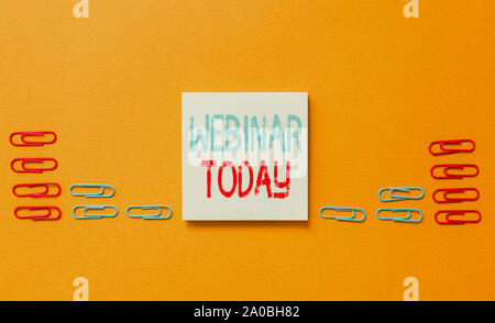 Word writing text Webinar Today. Business photo showcasing live online educational presentation on different location Colored blank sticky note clips Stock Photo