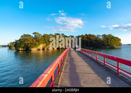 Fukuura Island with Fukuura Bridge in the famous Matsushima Bay. Beautiful islands covered with pine trees and rocks. One of the Three Views of Japan. Stock Photo