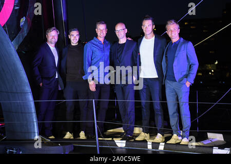 (left to right) Alex Thomson, Harry Winks, Henrik Stenson, Hugo Boss CEO Mark Langer, Andre Lotterer and Nico Rosberg at the christening ceremony for the Hugo Boss yacht in London. Stock Photo